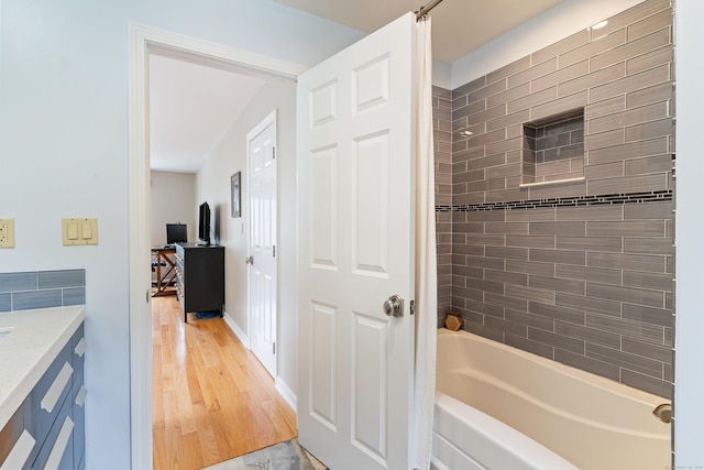 41 Arlington Rd, Stamford, CT 06902 - bathroom featuring vanity, shower / washtub combination, and wood finished floors