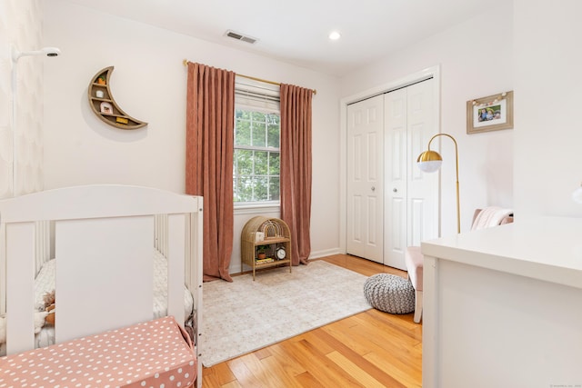 41 Arlington Rd, Stamford, CT 06902 - bedroom featuring light wood-type flooring, a closet, and recessed lighting