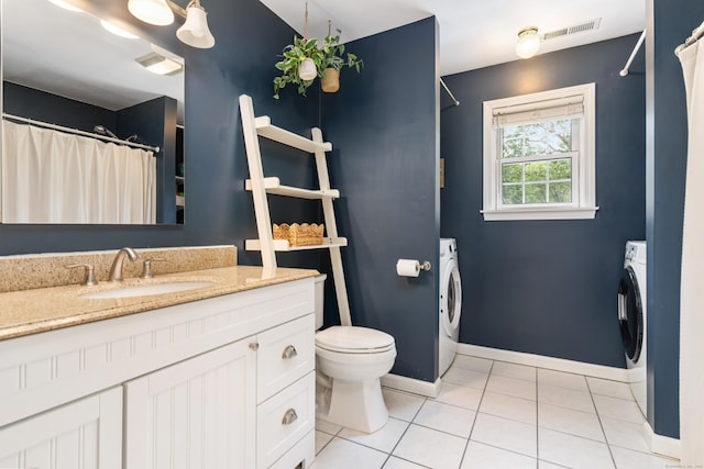 41 Arlington Rd, Stamford, CT 06902 - full bathroom featuring washer / clothes dryer, vanity, tile patterned floors, and a shower with shower curtain