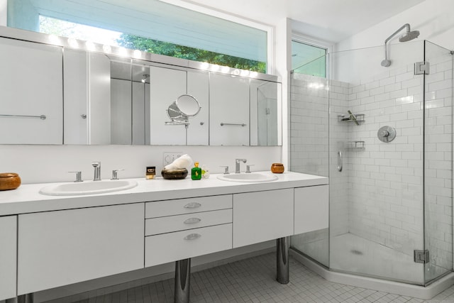 274 Nod Rd, Ridgefield, CT 06877 - bathroom with a stall shower, double vanity, and tile patterned floors