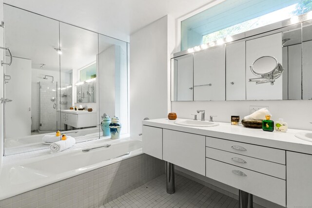 274 Nod Rd, Ridgefield, CT 06877 - full bathroom with a shower stall, double vanity, a bath, and plenty of natural light