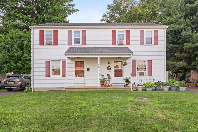 6 Fern St, Norwalk, CT 06854 - view of front of property with a front yard and cooling unit