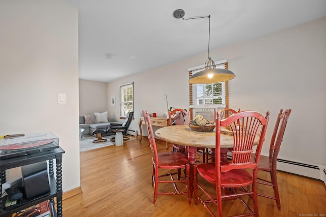 6 Fern St, Norwalk, CT 06854 - dining room featuring wood finished floors and a baseboard heating unit