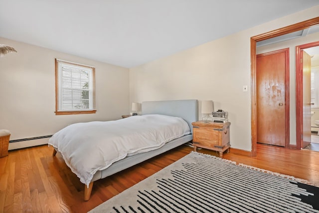 6 Fern St, Norwalk, CT 06854 - bedroom with baseboard heating and wood finished floors