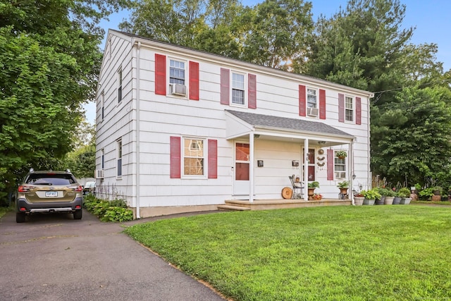 6 Fern St, Norwalk, CT 06854 - view of front of house with a front yard and driveway