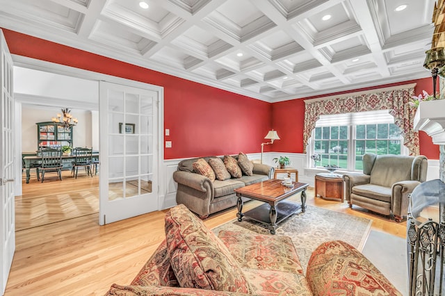 28 Aldo Dr, Woodbridge, CT 06525 - living area with wood finished floors, coffered ceiling, recessed lighting, ornamental molding, and a chandelier