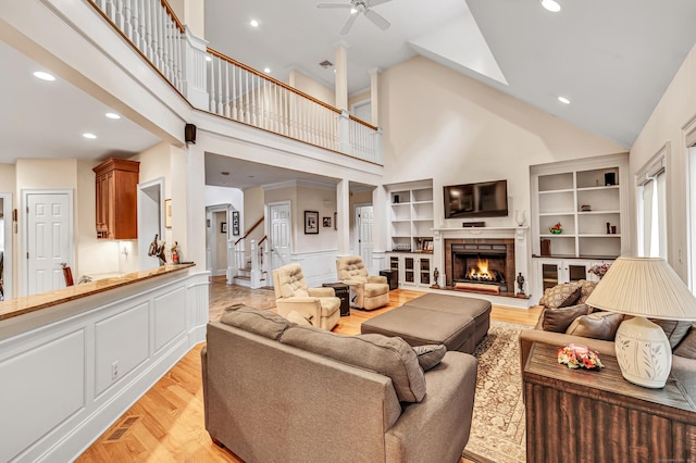 28 Aldo Dr, Woodbridge, CT 06525 - living area featuring high vaulted ceiling, ceiling fan, stairway, light wood finished floors, and recessed lighting