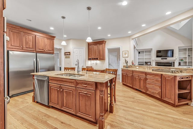 28 Aldo Dr, Woodbridge, CT 06525 - kitchen with light wood-type flooring, light stone counters, stainless steel appliances, and recessed lighting