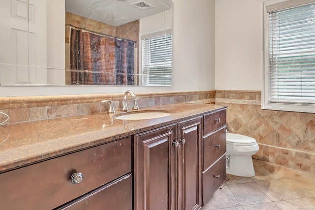 28 Aldo Dr, Woodbridge, CT 06525 - bathroom featuring vanity, plenty of natural light, tile patterned flooring, tile walls, and a shower with curtain