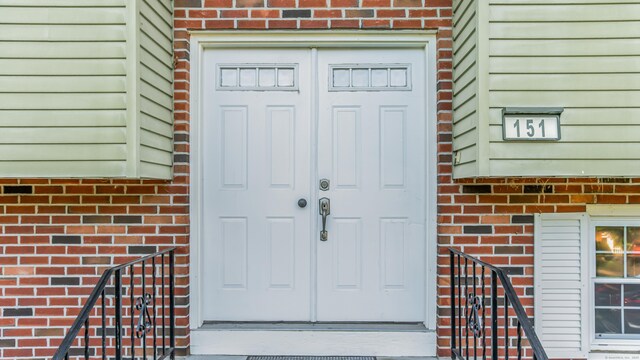 151 Stevenson Rd, Meriden, CT 06451 - property entrance featuring brick siding