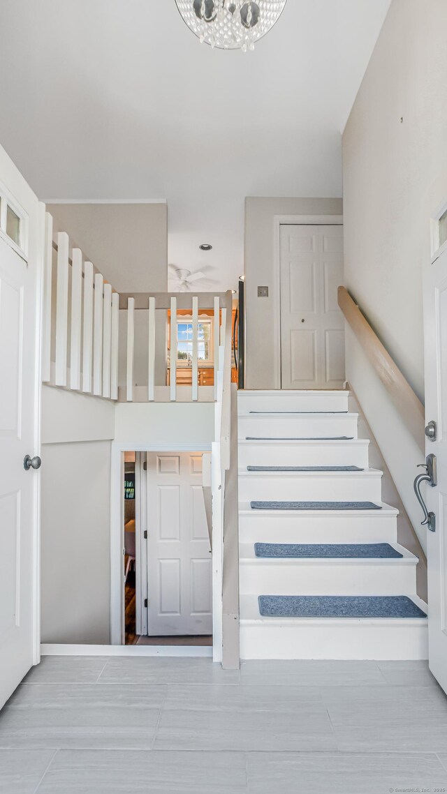 151 Stevenson Rd, Meriden, CT 06451 - stairway with a chandelier, recessed lighting, and wood finished floors