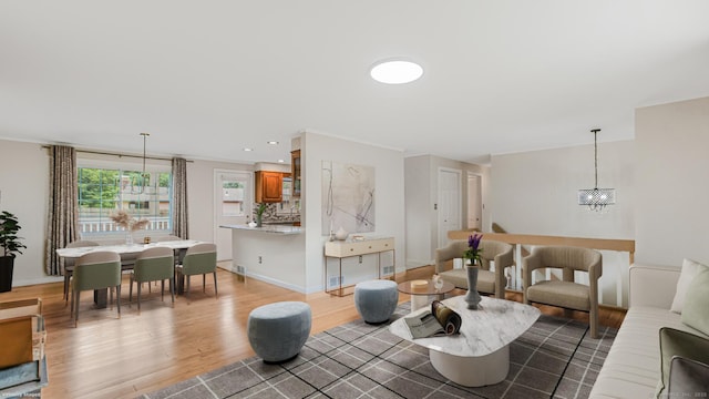 151 Stevenson Rd, Meriden, CT 06451 - living area with light wood-style flooring, a chandelier, and recessed lighting