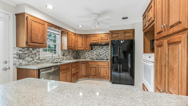 151 Stevenson Rd, Meriden, CT 06451 - kitchen with black appliances, brown cabinets, a ceiling fan, and recessed lighting
