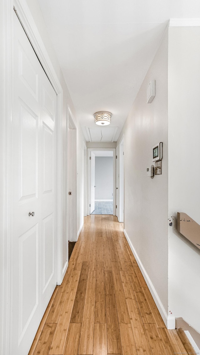 151 Stevenson Rd, Meriden, CT 06451 - hallway featuring light wood-type flooring and attic access