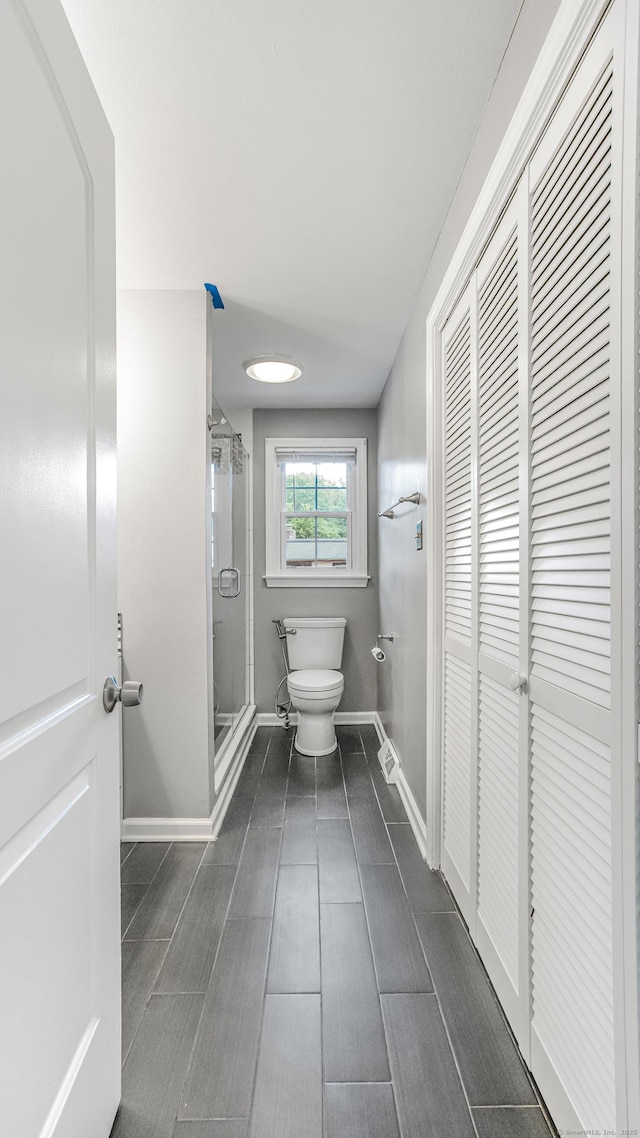 151 Stevenson Rd, Meriden, CT 06451 - bathroom featuring a shower stall and a closet