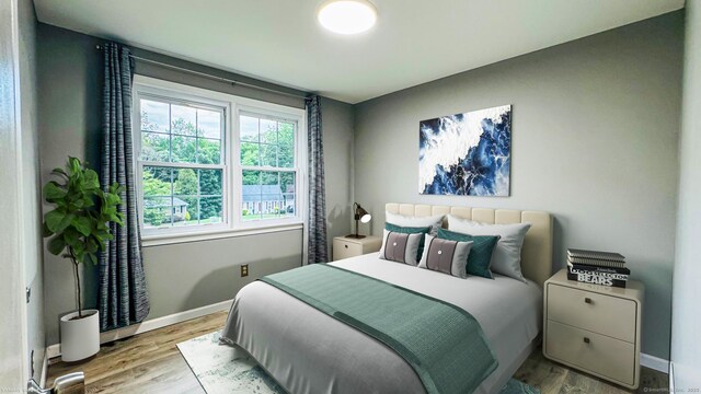 151 Stevenson Rd, Meriden, CT 06451 - bedroom with wood finished floors and baseboards