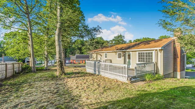 151 Stevenson Rd, Meriden, CT 06451 - rear view of property with a chimney and a wooden deck
