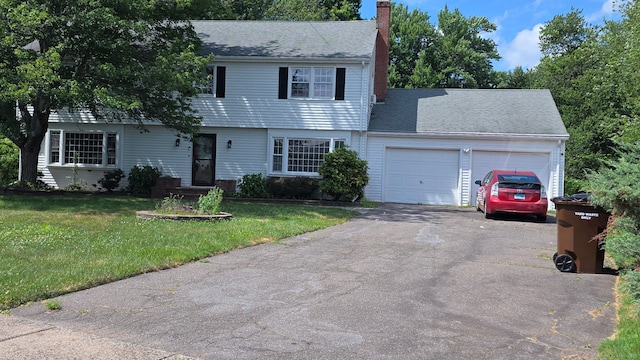 31 Glenwood Rd, Wethersfield, CT 06109 - colonial home featuring a garage, driveway, a chimney, a front lawn, and a shingled roof