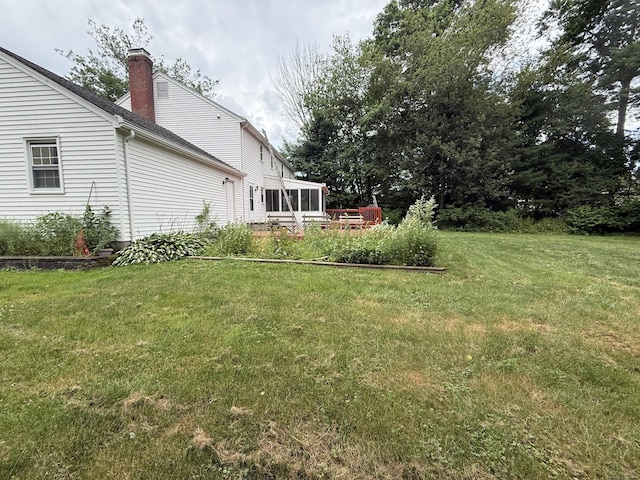 31 Glenwood Rd, Wethersfield, CT 06109 - view of green lawn with a sunroom