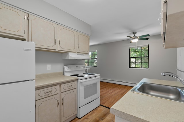 37 Enid St Apt C, Bridgeport, CT 06606 - kitchen with white appliances, a baseboard heating unit, under cabinet range hood, ceiling fan, and light wood finished floors