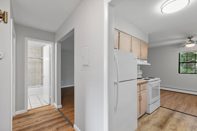 37 Enid St Apt C, Bridgeport, CT 06606 - kitchen featuring white appliances, a baseboard heating unit, under cabinet range hood, a ceiling fan, and light wood-type flooring