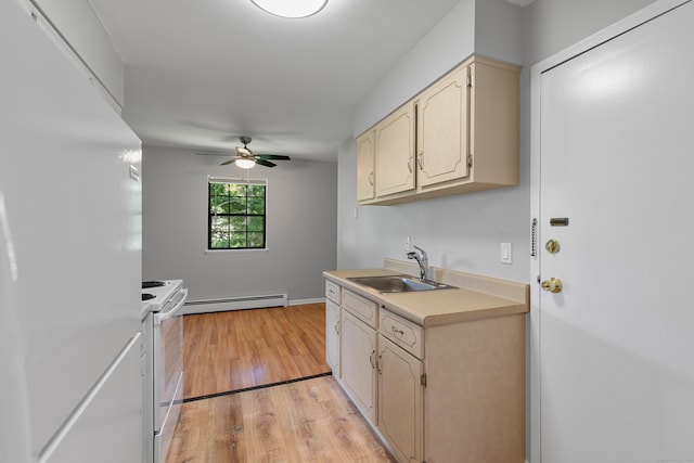 37 Enid St Apt C, Bridgeport, CT 06606 - kitchen featuring white appliances, ceiling fan, light countertops, a baseboard radiator, and light wood-type flooring