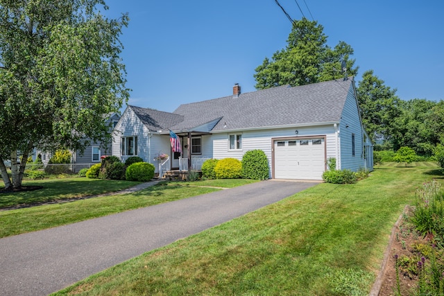 33 Hazel Ave, Naugatuck, CT 06770 - view of front of house with a garage, a chimney, asphalt driveway, and a shingled roof