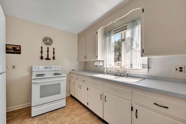 33 Hazel Ave, Naugatuck, CT 06770 - kitchen with white electric range, light countertops, and white cabinets