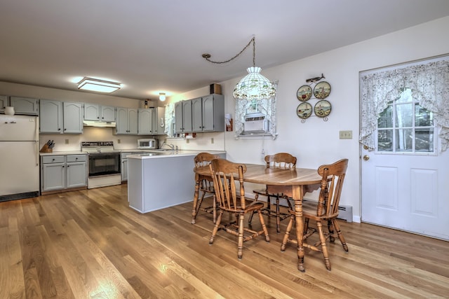 67 Nicole Dr, Naugatuck, CT 06770 - dining space featuring light wood-style floors and cooling unit