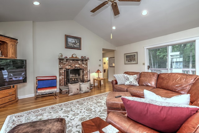 67 Nicole Dr, Naugatuck, CT 06770 - living room featuring a ceiling fan, lofted ceiling, wood finished floors, a fireplace, and recessed lighting