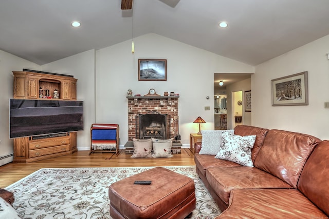 67 Nicole Dr, Naugatuck, CT 06770 - living area with lofted ceiling, ceiling fan, wood finished floors, a brick fireplace, and recessed lighting