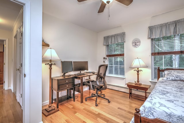 67 Nicole Dr, Naugatuck, CT 06770 - bedroom with wood finished floors, multiple windows, an office area, and baseboard heating