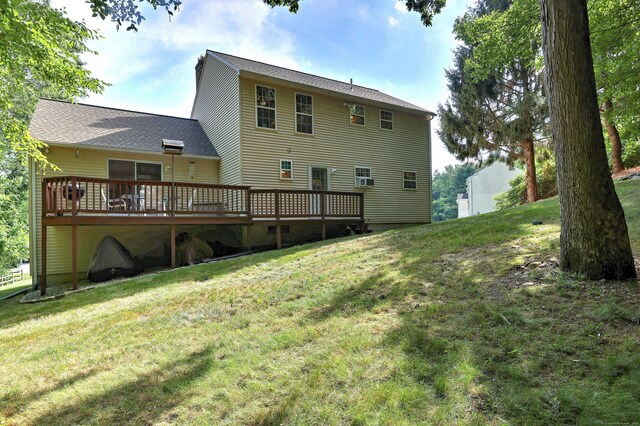 67 Nicole Dr, Naugatuck, CT 06770 - rear view of property with a wooden deck, a lawn, and a shingled roof