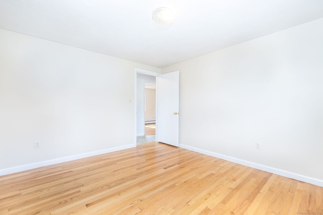 51 Euston St, New Britain, CT 06053 - unfurnished room with baseboards and light wood finished floors