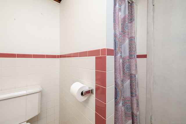 51 Euston St, New Britain, CT 06053 - full bath featuring tile walls, curtained shower, and wainscoting