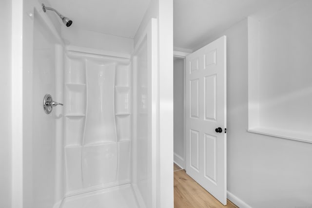 64 Ridgefield Rd, Wallingford, CT 06492 - bathroom featuring a shower and wood finished floors