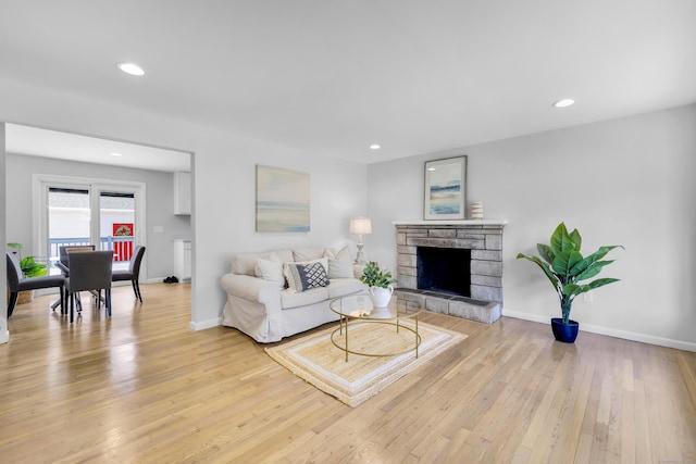 64 Ridgefield Rd, Wallingford, CT 06492 - living room with light wood finished floors, recessed lighting, and a fireplace