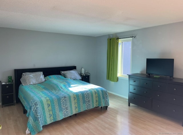 122 Trolley Crossing Ln Unit 122, Middletown, CT 06457 - bedroom with light wood-type flooring and baseboards