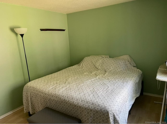 122 Trolley Crossing Ln Unit 122, Middletown, CT 06457 - bedroom with wood finished floors and baseboards