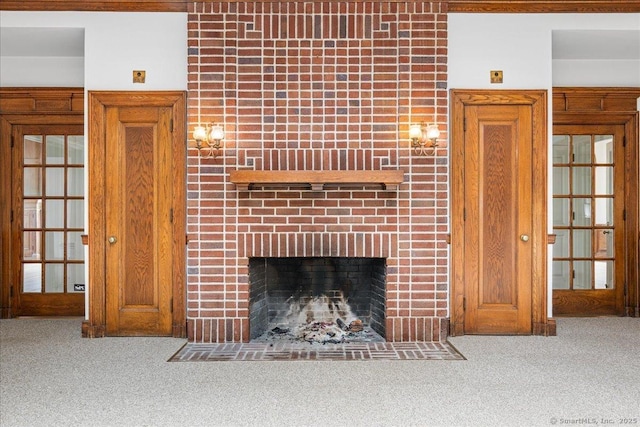 31 N Main St, Essex, CT 06426 - unfurnished living room with carpet flooring and a fireplace