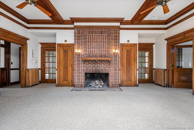 31 N Main St, Essex, CT 06426 - unfurnished living room with a ceiling fan, crown molding, radiator, carpet flooring, and a tiled fireplace