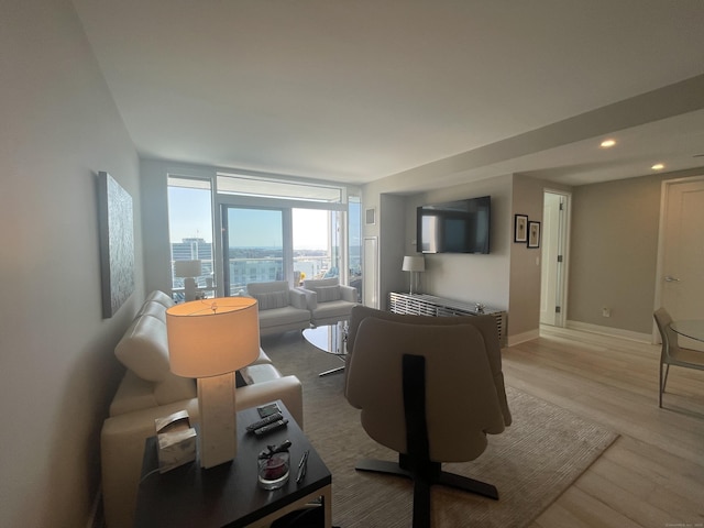 1 Broad St Unit Ph 26E, Stamford, CT 06901 - living room with light wood-style flooring and recessed lighting