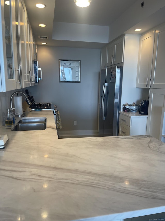 1 Broad St Unit Ph 26E, Stamford, CT 06901 - kitchen featuring appliances with stainless steel finishes, recessed lighting, and glass insert cabinets