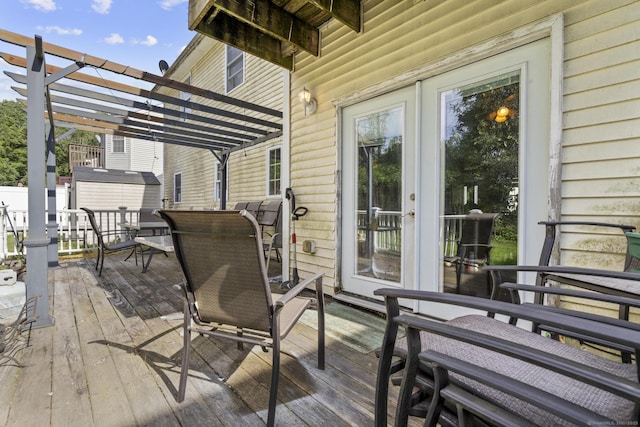 20 Society Hill Rd, Waterbury, CT 06704 - wooden terrace with a pergola, a storage unit, and french doors