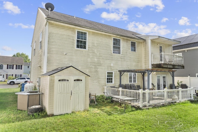 20 Society Hill Rd, Waterbury, CT 06704 - back of house with a storage unit, a yard, a wooden deck, and french doors