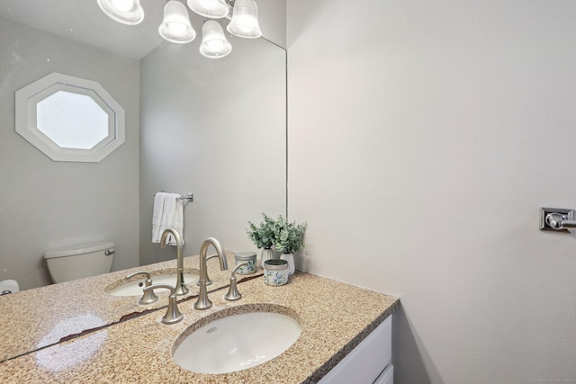 223 N St, Ridgefield, CT 06877 - half bathroom featuring vanity and toilet