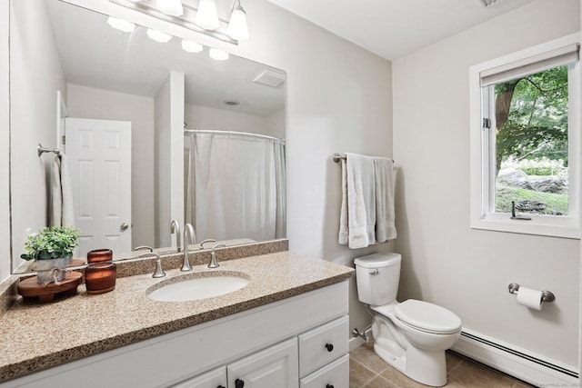 223 N St, Ridgefield, CT 06877 - full bathroom featuring baseboard heating, vanity, and tile patterned floors