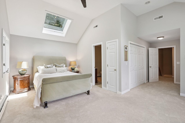 223 N St, Ridgefield, CT 06877 - bedroom featuring a skylight, light carpet, baseboard heating, high vaulted ceiling, and a ceiling fan