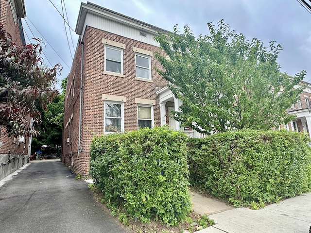 310 Bond St, Bridgeport, CT 06610 - view of front of property with brick siding