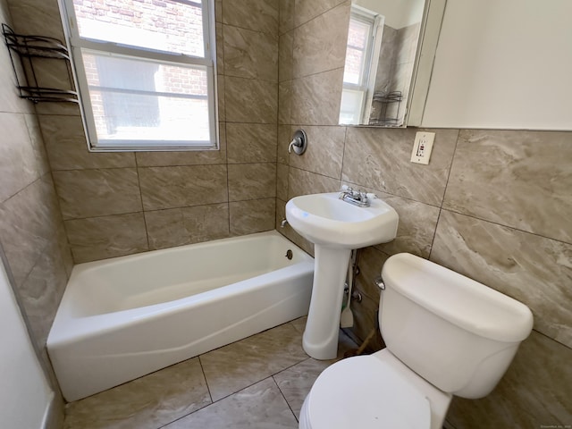 310 Bond St, Bridgeport, CT 06610 - full bath featuring tile walls and bathtub / shower combination